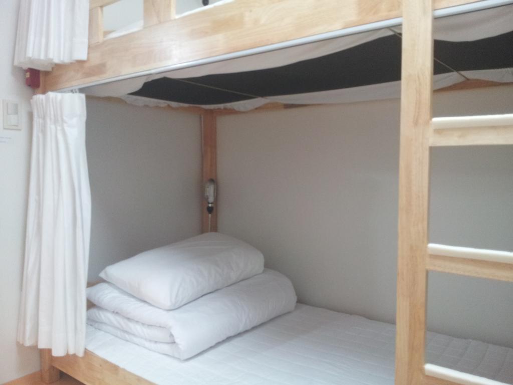 Happytree Guesthouse Seoul Værelse billede